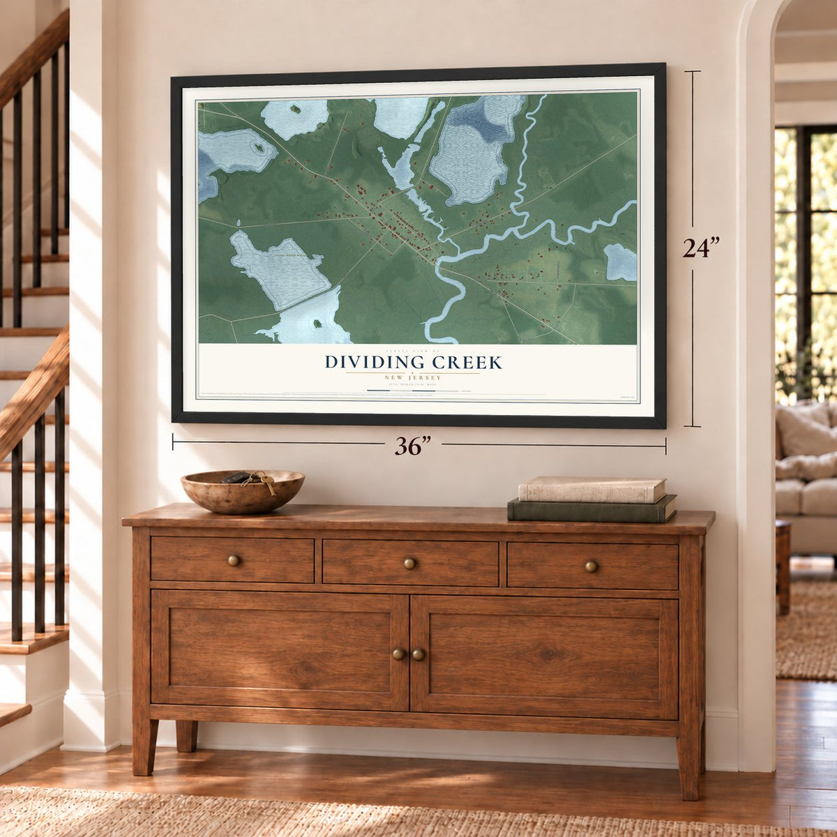 Dividing Creek, New Jersey map, 24 x 36 inch print in a black frame above a dresser by a staircase