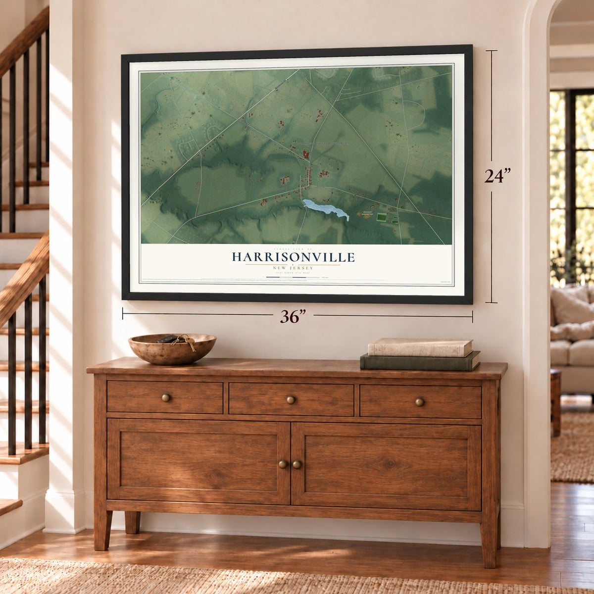 Harrisonville, New Jersey map, 24 x 36 inch print in a black frame above a dresser by a staircase