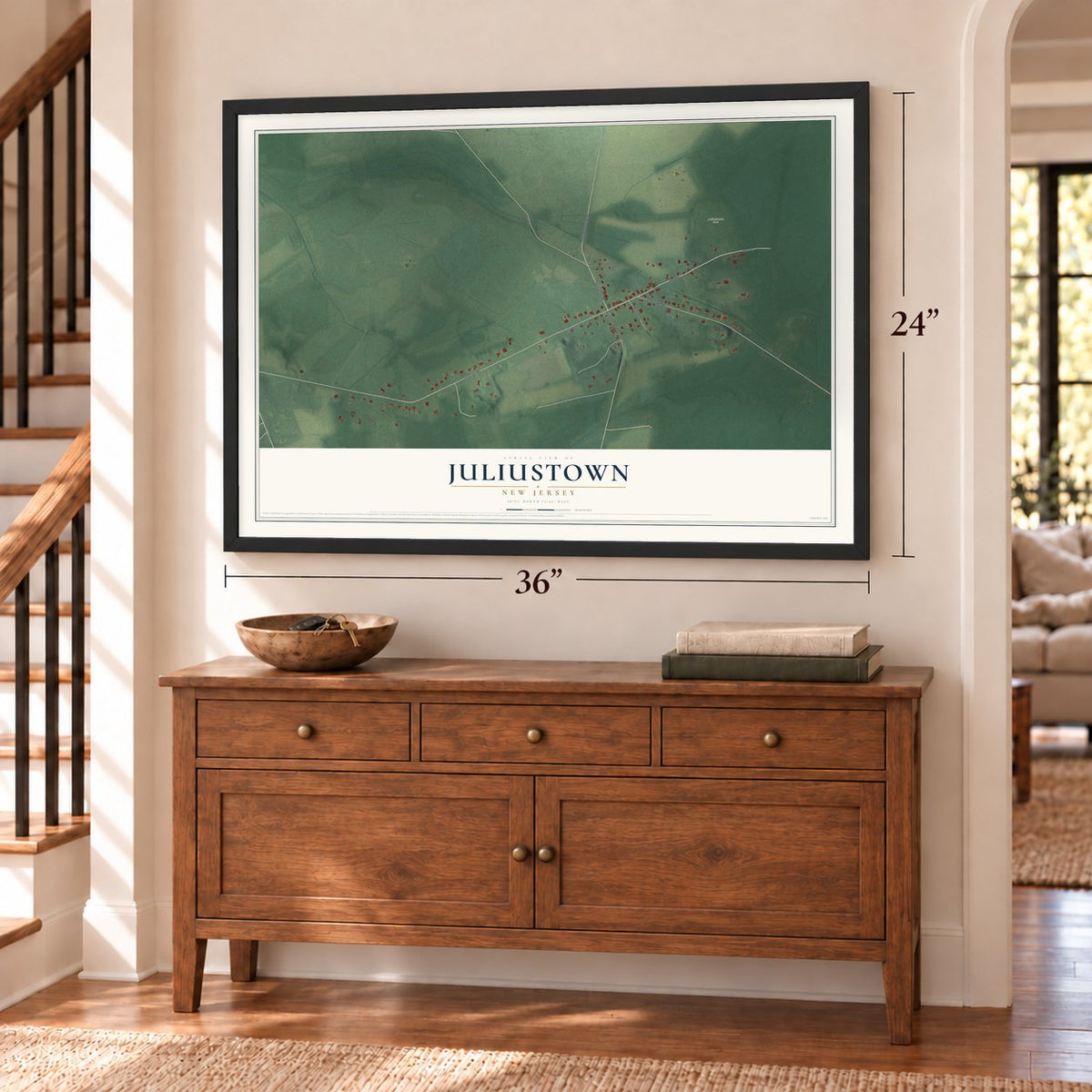 Juliustown, New Jersey map, 24 x 36 inch print in a black frame above a dresser by a staircase