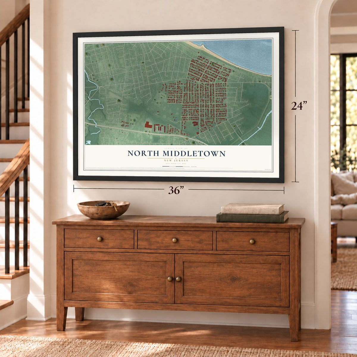 North Middletown, New Jersey map, 24 x 36 inch print in a black frame above a dresser by a staircase