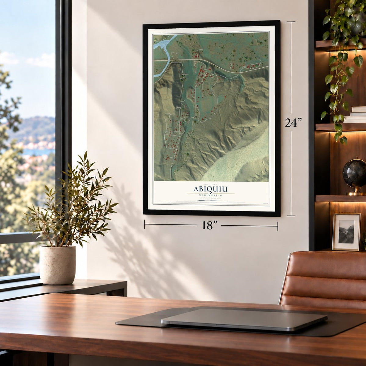 Abiquiu, New Mexico map, 18 x 24 inch print in a black frame in a home office