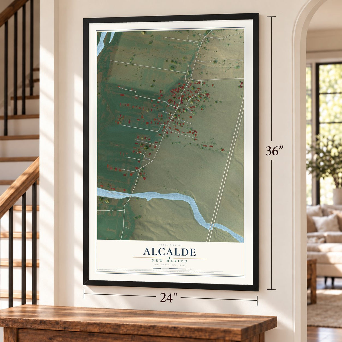 Alcalde, New Mexico map, 24 x 36 inch print in a black frame by a staircase