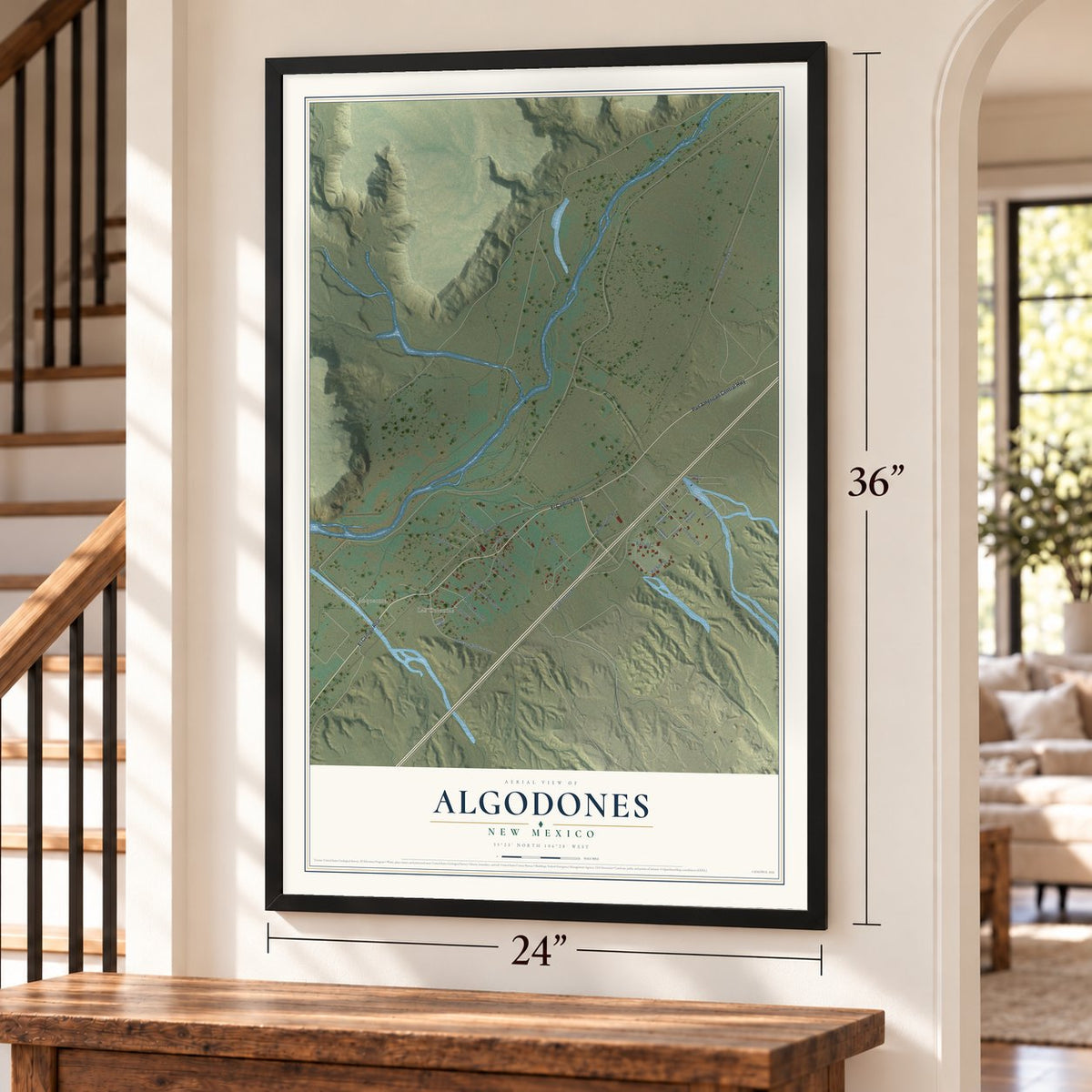 Algodones, New Mexico map, 24 x 36 inch print in a black frame by a staircase