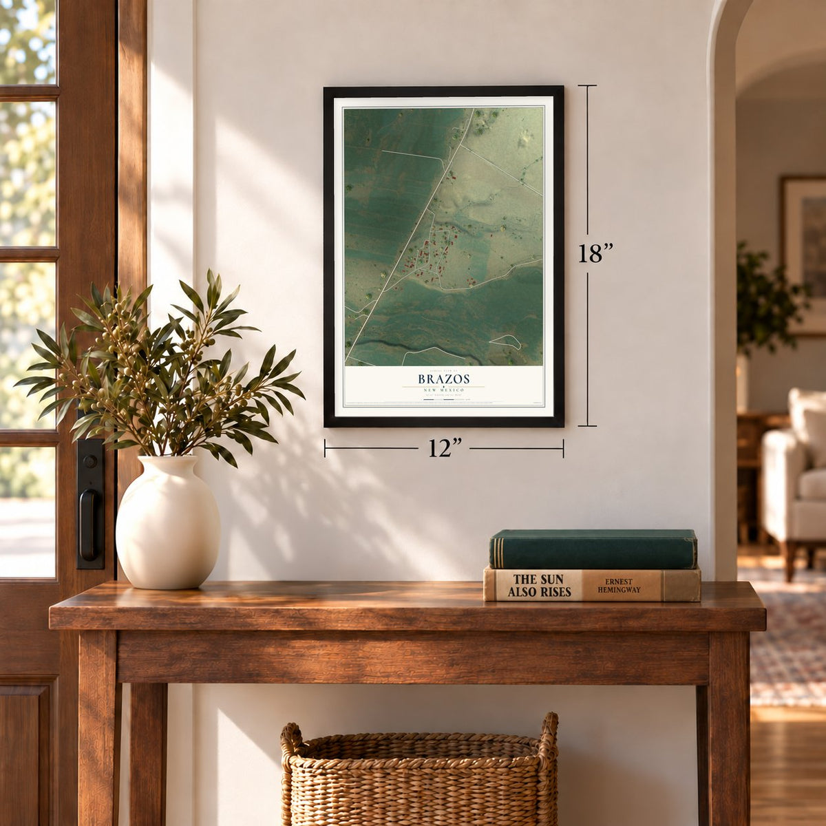 Brazos, New Mexico map, 12 x 18 inch print in a black frame in an entryway