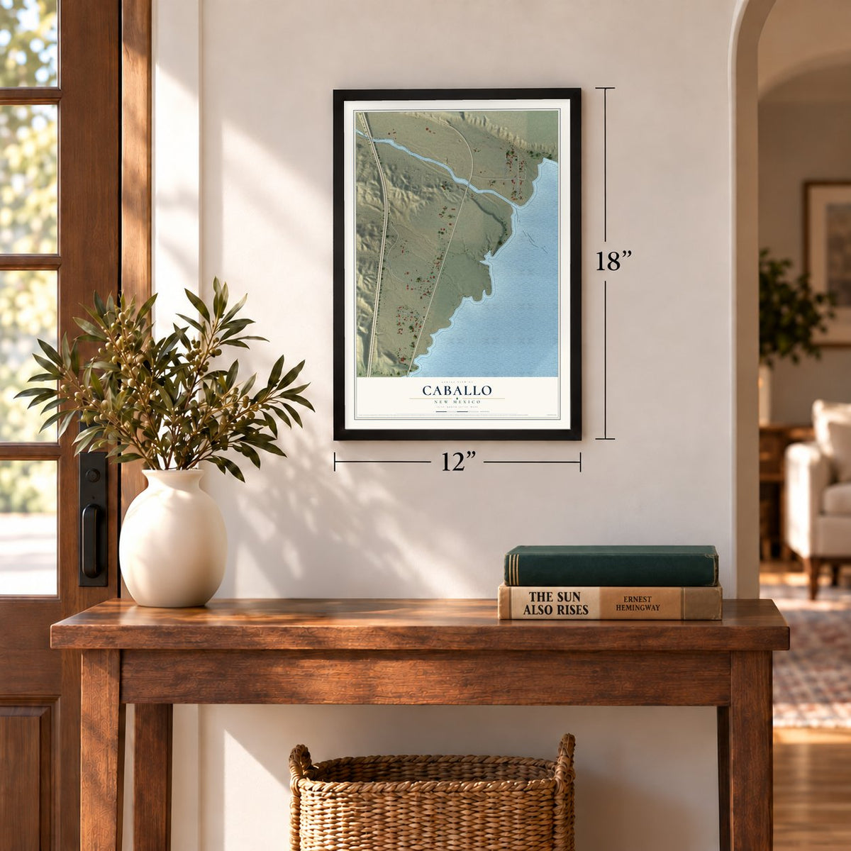 Caballo, New Mexico map, 12 x 18 inch print in a black frame in an entryway