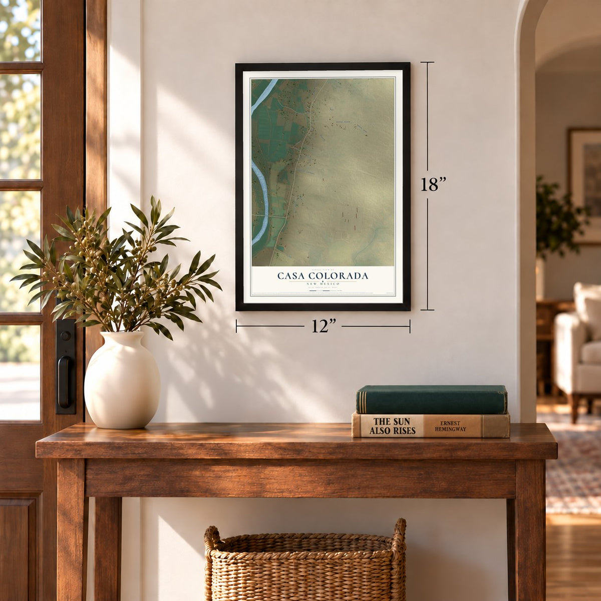 Casa Colorada, New Mexico map, 12 x 18 inch print in a black frame in an entryway
