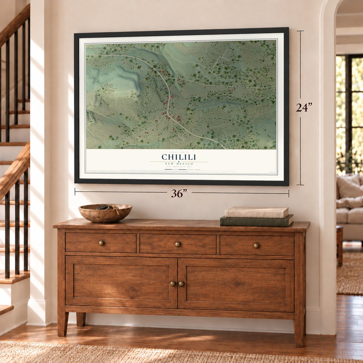 Chilili, New Mexico map, 24 x 36 inch print in a black frame above a dresser by a staircase