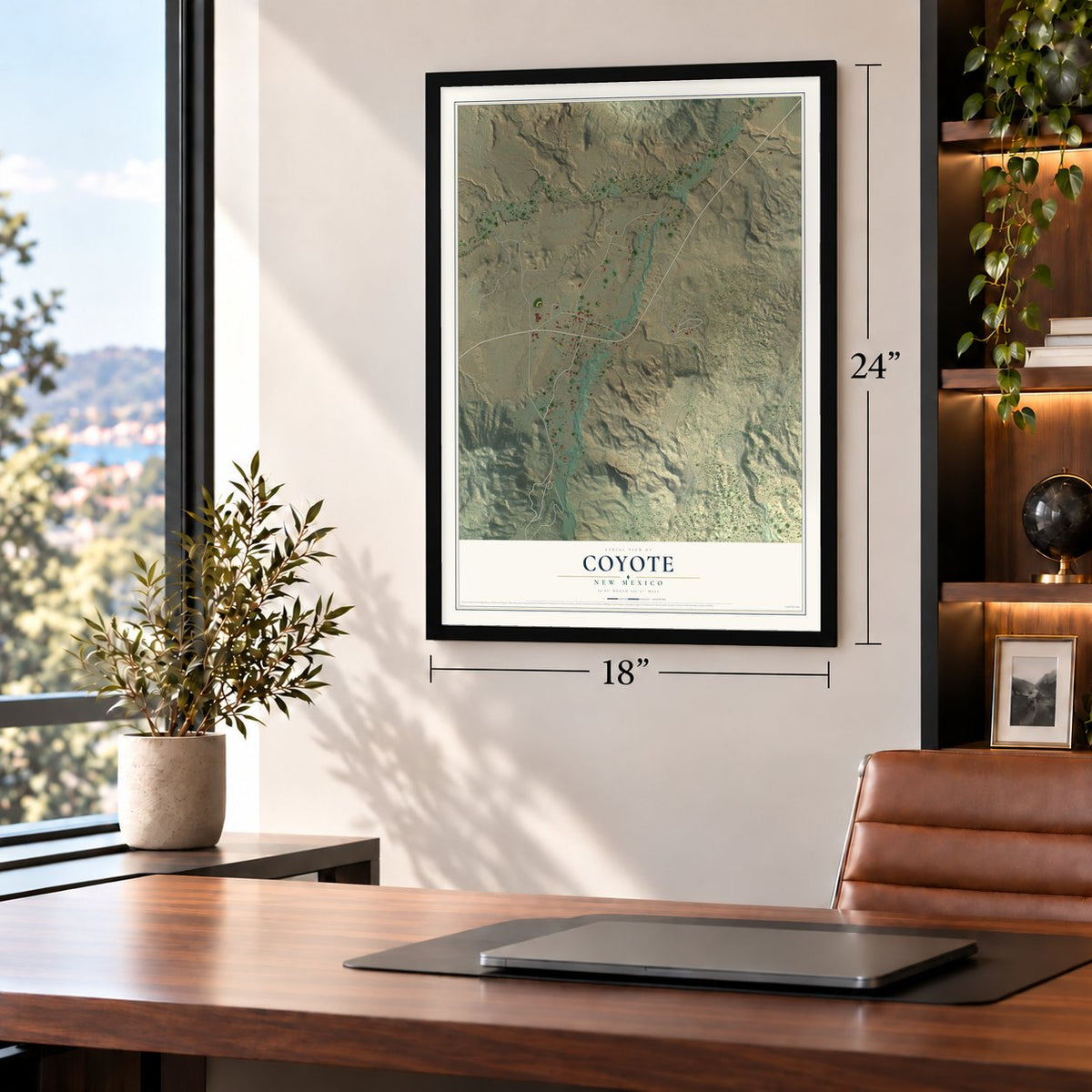 Coyote, New Mexico map, 18 x 24 inch print in a black frame in a home office