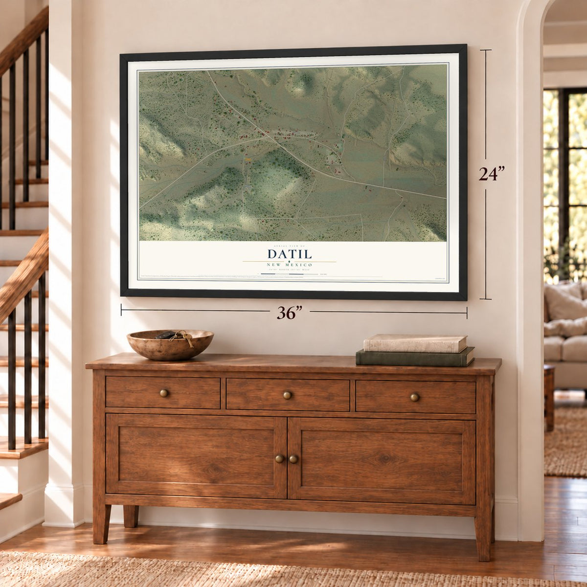 Datil, New Mexico map, 24 x 36 inch print in a black frame above a dresser by a staircase