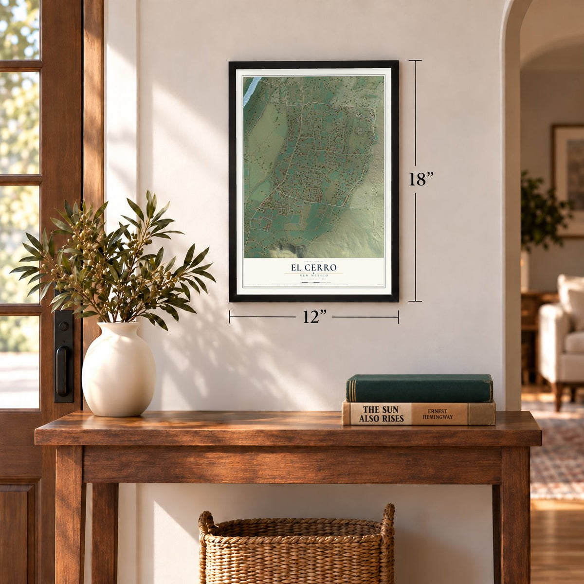 El Cerro, New Mexico map, 12 x 18 inch print in a black frame in an entryway