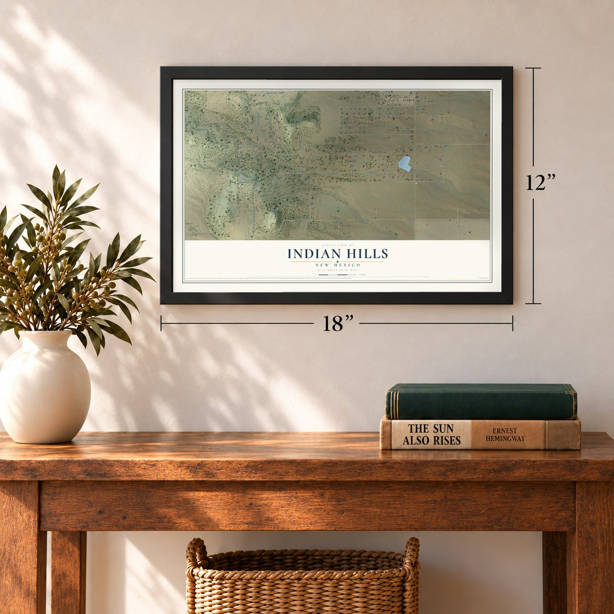 Indian Hills, New Mexico map, 12 x 18 inch print in a black frame in an entryway
