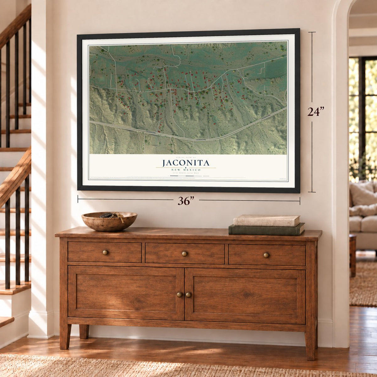 Jaconita, New Mexico map, 24 x 36 inch print in a black frame above a dresser by a staircase