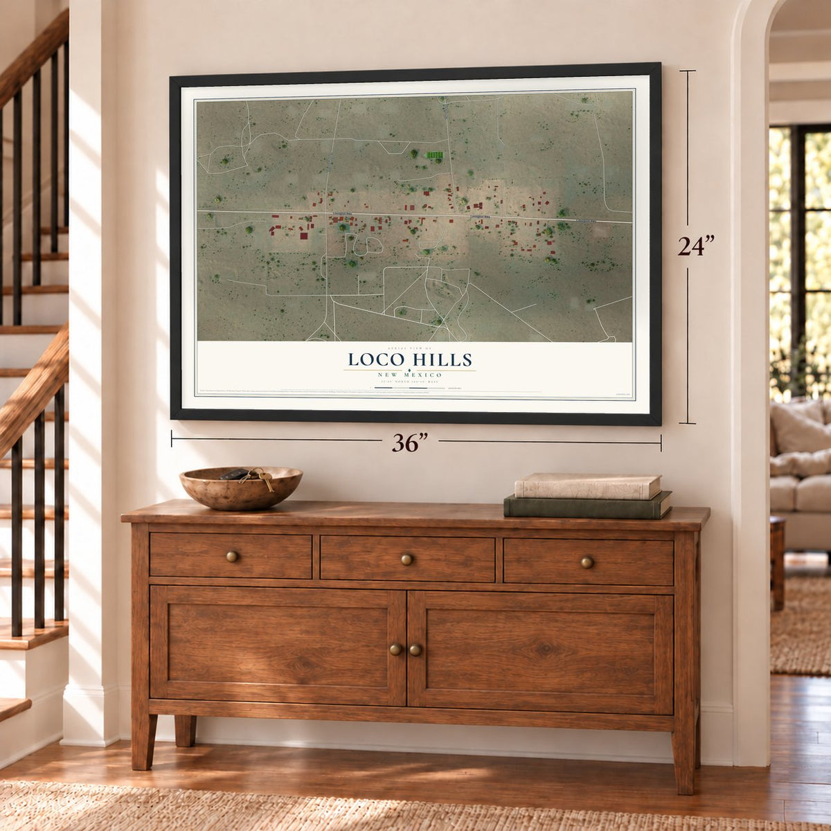 Loco Hills, New Mexico map, 24 x 36 inch print in a black frame above a dresser by a staircase