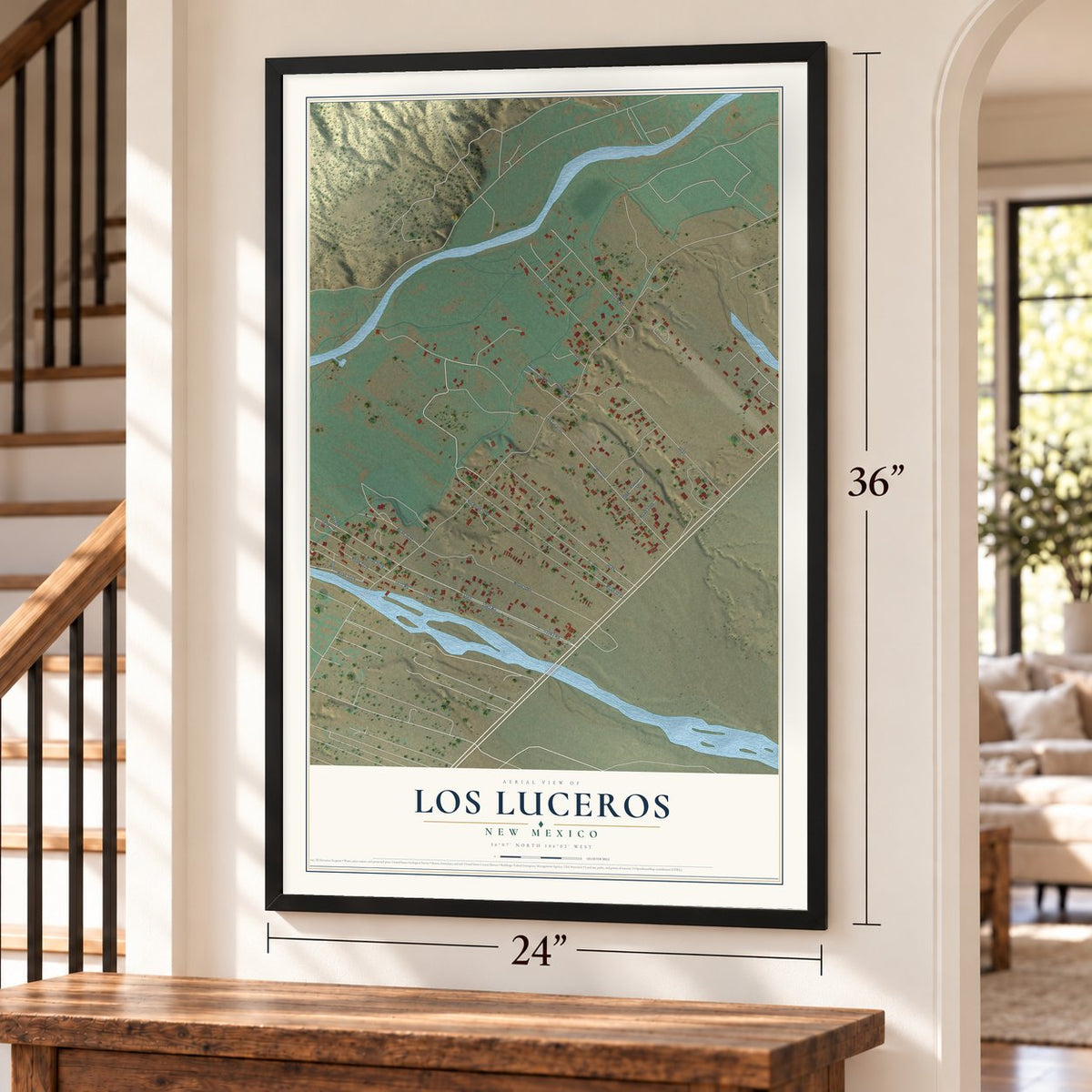 Los Luceros, New Mexico map, 24 x 36 inch print in a black frame by a staircase