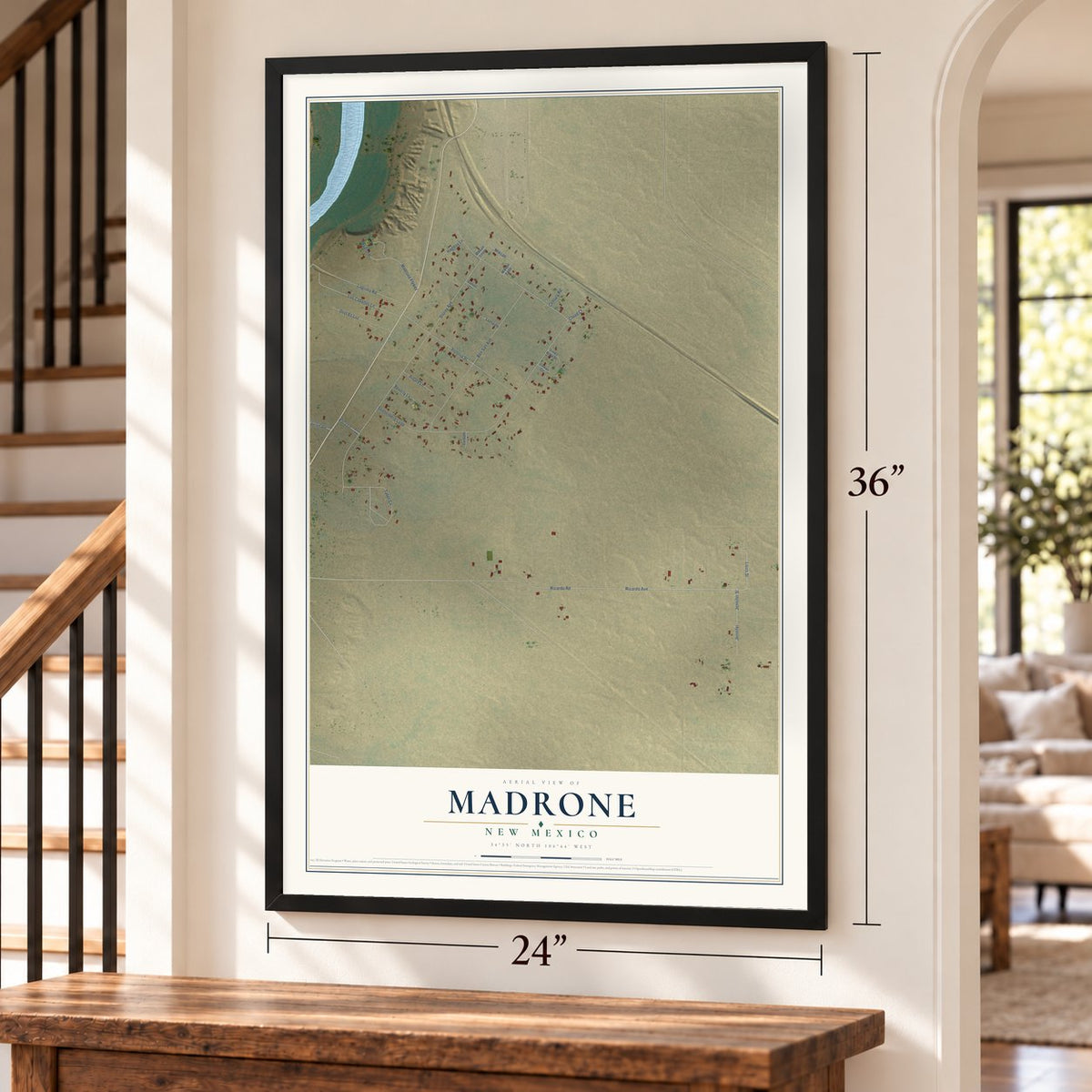 Madrone, New Mexico map, 24 x 36 inch print in a black frame by a staircase