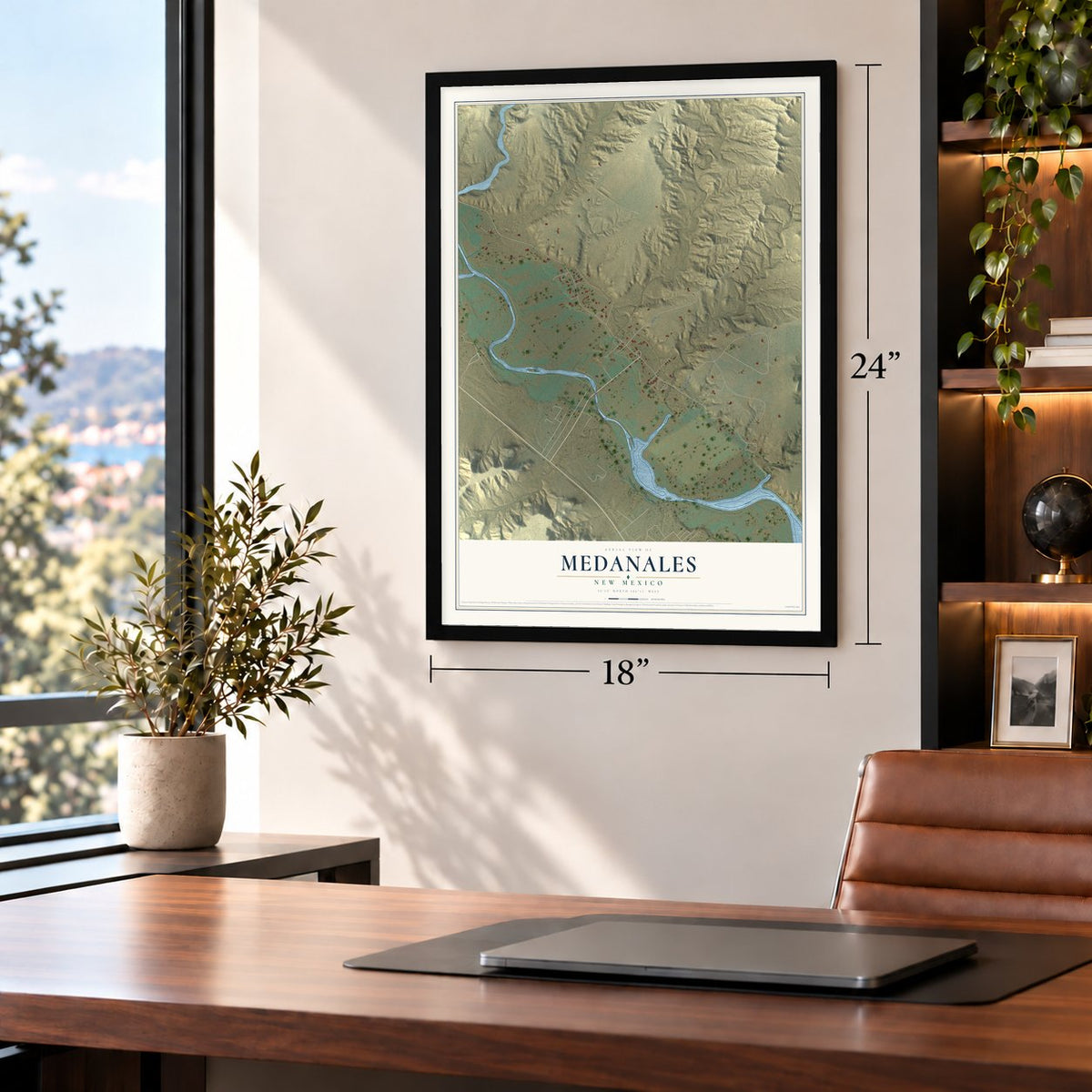 Medanales, New Mexico map, 18 x 24 inch print in a black frame in a home office