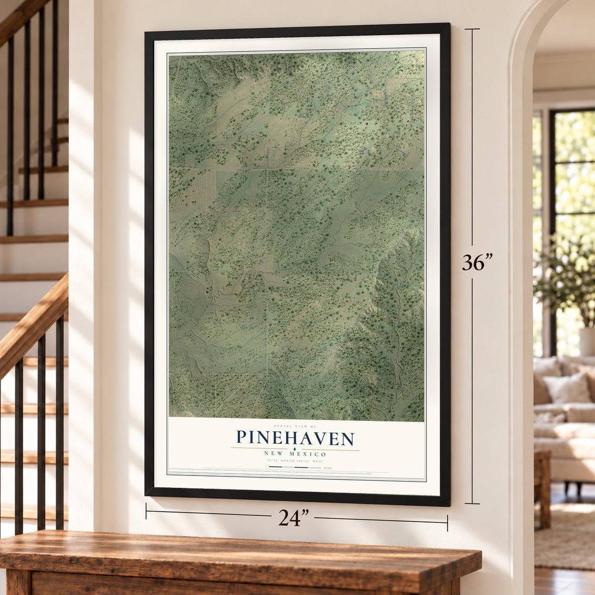 Pinehaven, New Mexico map, 24 x 36 inch print in a black frame by a staircase