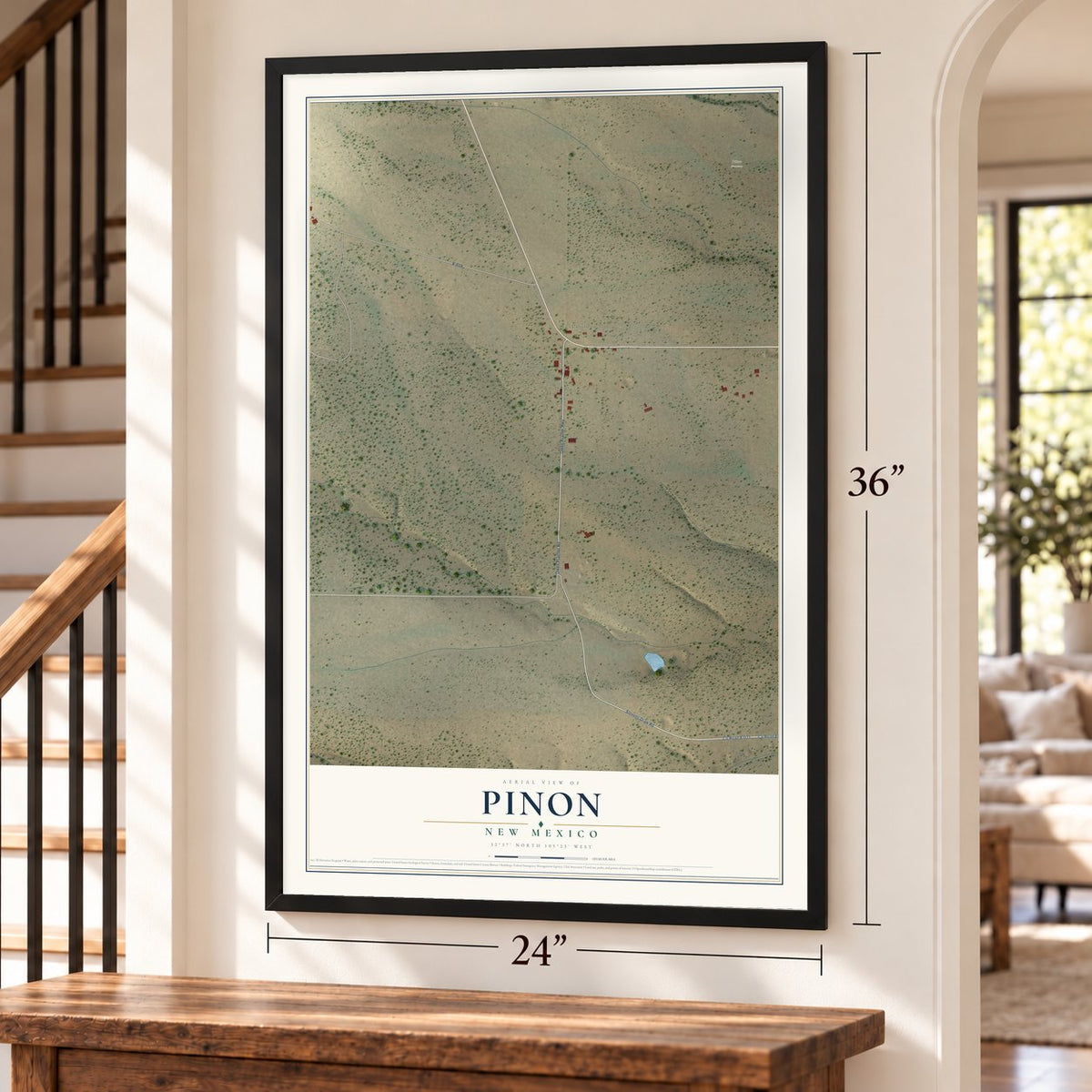 Pinon, New Mexico map, 24 x 36 inch print in a black frame by a staircase