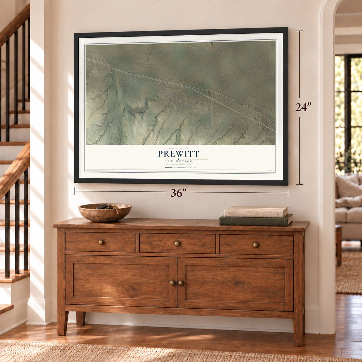 Prewitt, New Mexico map, 24 x 36 inch print in a black frame above a dresser by a staircase