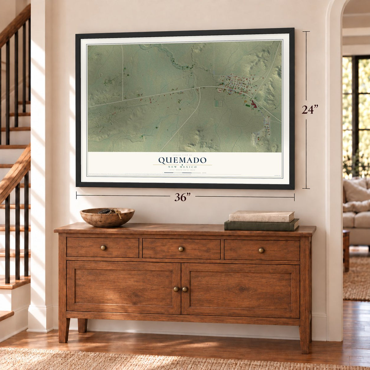 Quemado, New Mexico map, 24 x 36 inch print in a black frame above a dresser by a staircase
