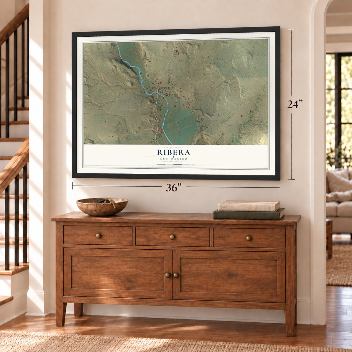 Ribera, New Mexico map, 24 x 36 inch print in a black frame above a dresser by a staircase