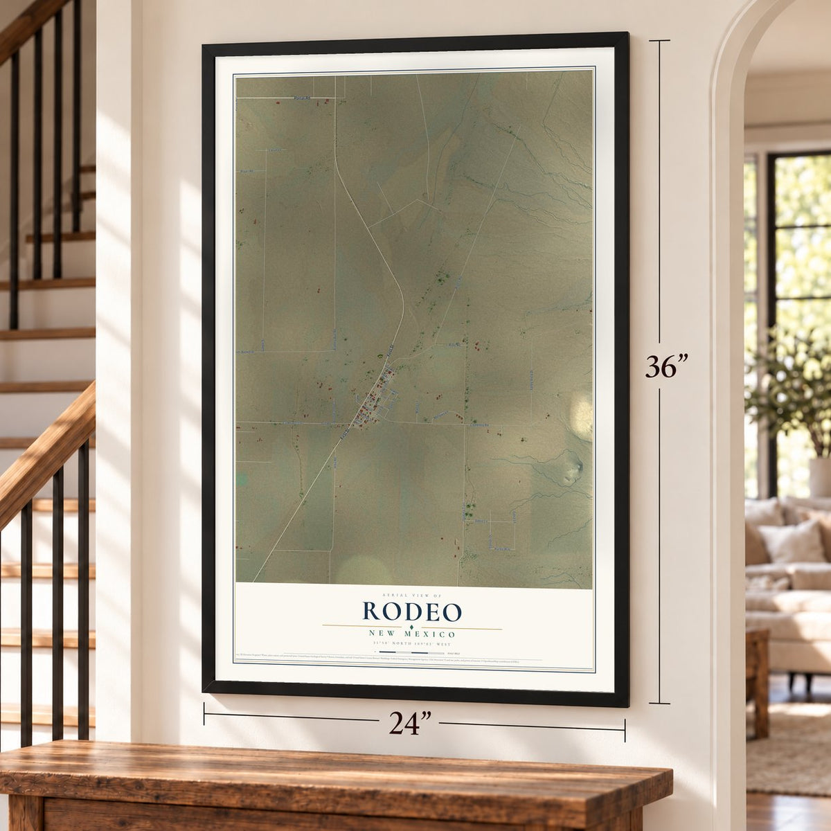 Rodeo, New Mexico map, 24 x 36 inch print in a black frame by a staircase