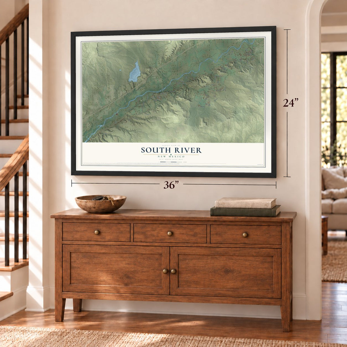 South River, New Mexico map, 24 x 36 inch print in a black frame above a dresser by a staircase