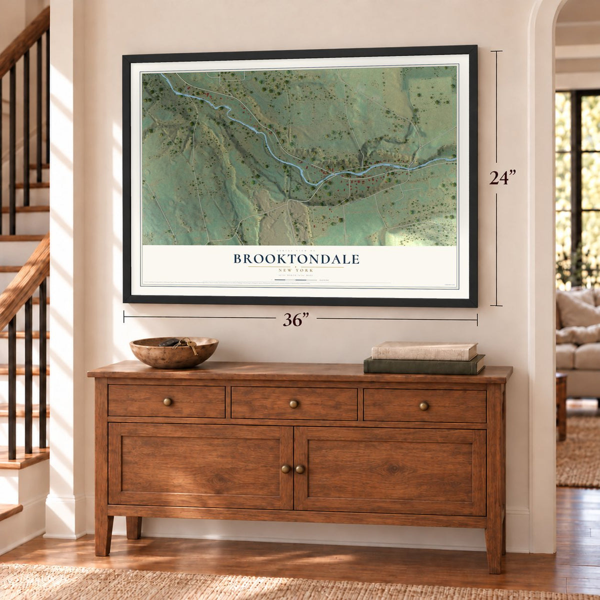 Brooktondale, New York map, 24 x 36 inch print in a black frame above a dresser by a staircase
