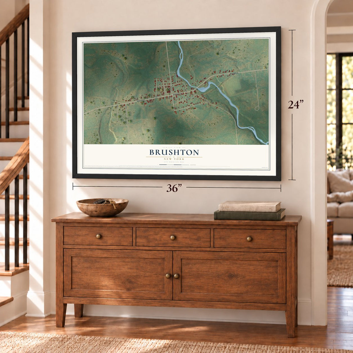 Brushton, New York map, 24 x 36 inch print in a black frame above a dresser by a staircase