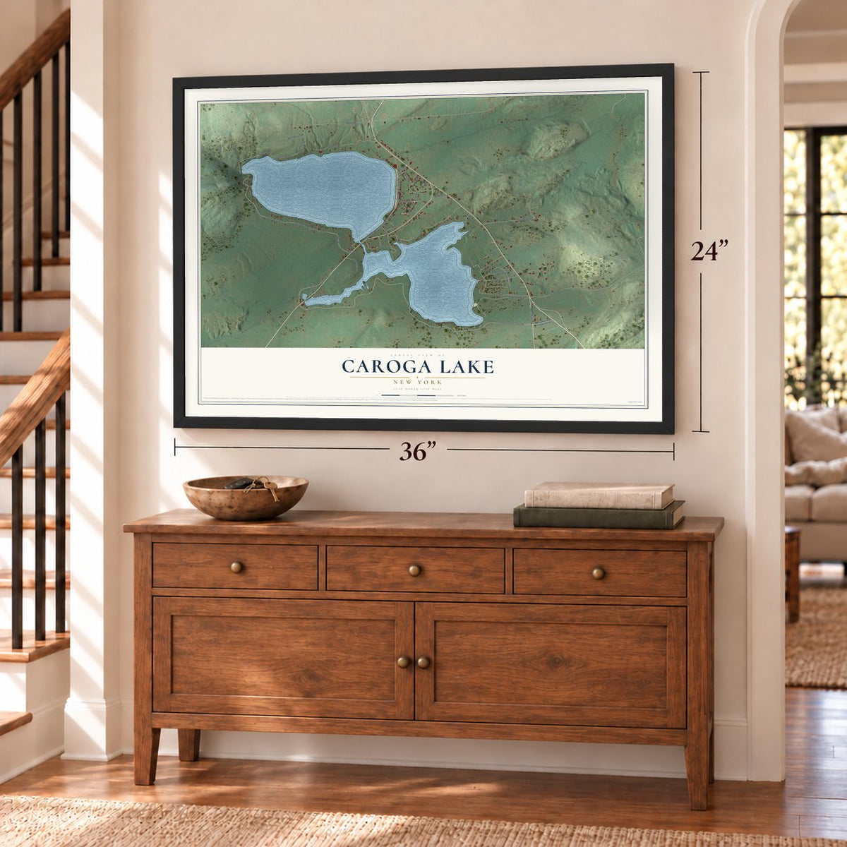 Caroga Lake, New York map, 24 x 36 inch print in a black frame above a dresser by a staircase