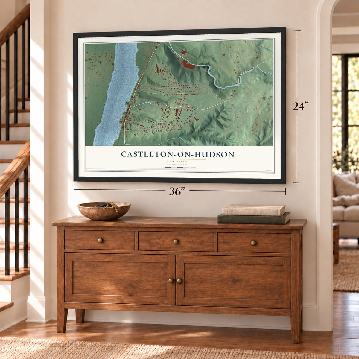 Castleton-on-Hudson, New York map, 24 x 36 inch print in a black frame above a dresser by a staircase