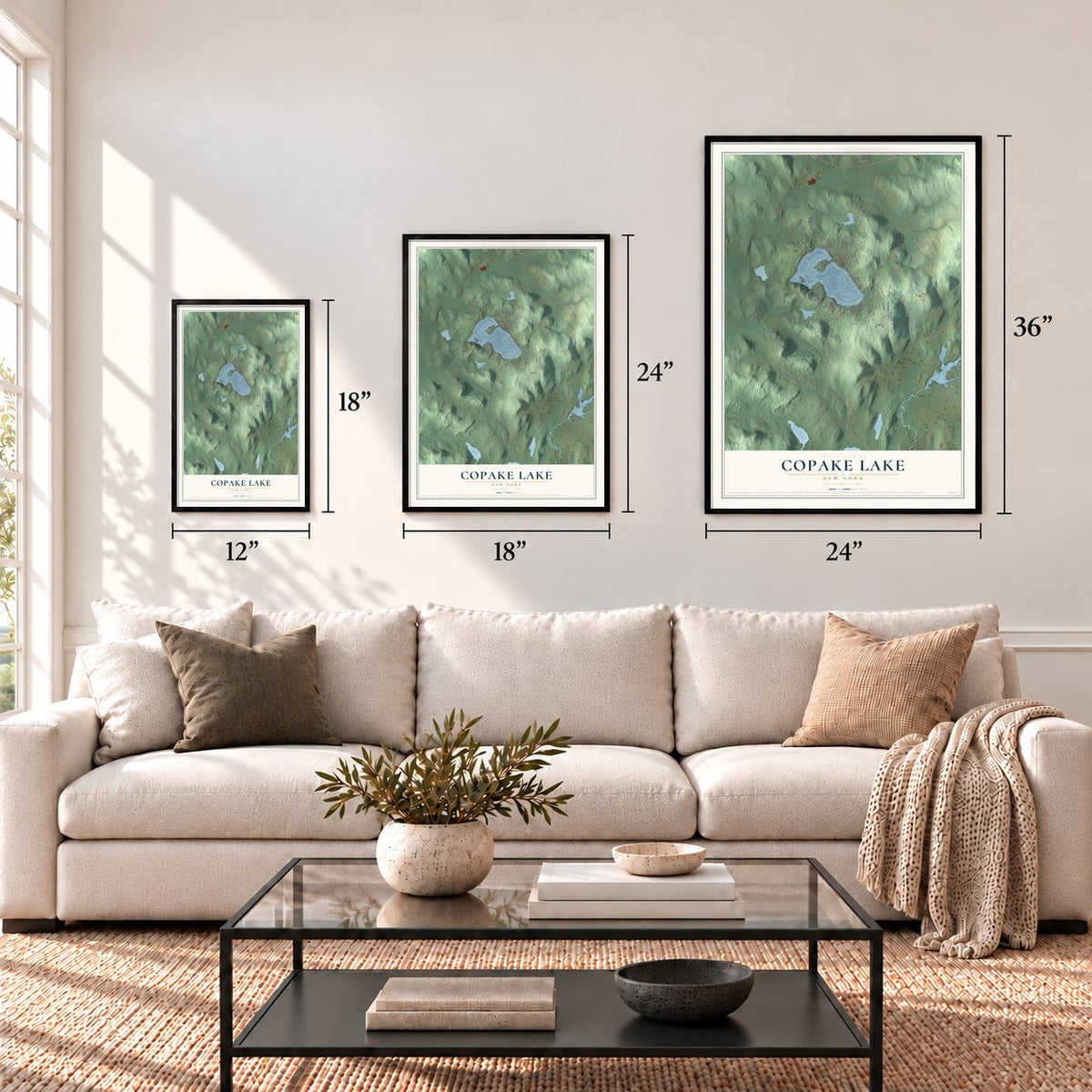 Copake Lake, New York map in 12 x 18, 18 x 24 and 24 x 36 inch sizes above a sofa