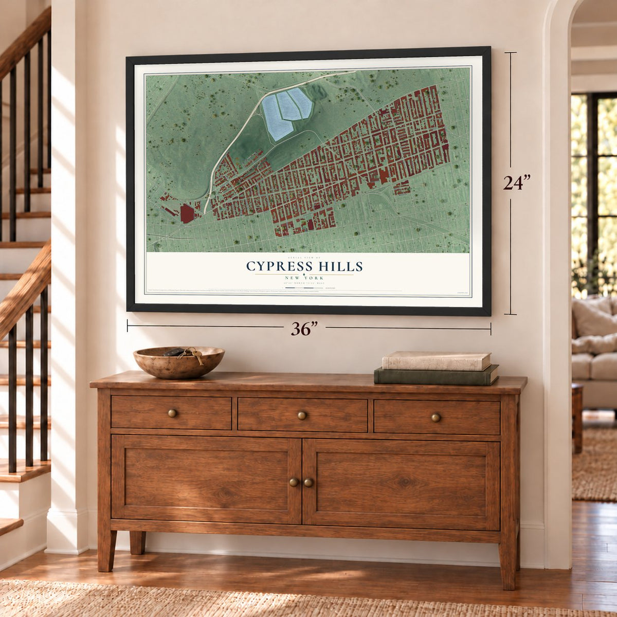 Cypress Hills, New York map, 24 x 36 inch print in a black frame above a dresser by a staircase