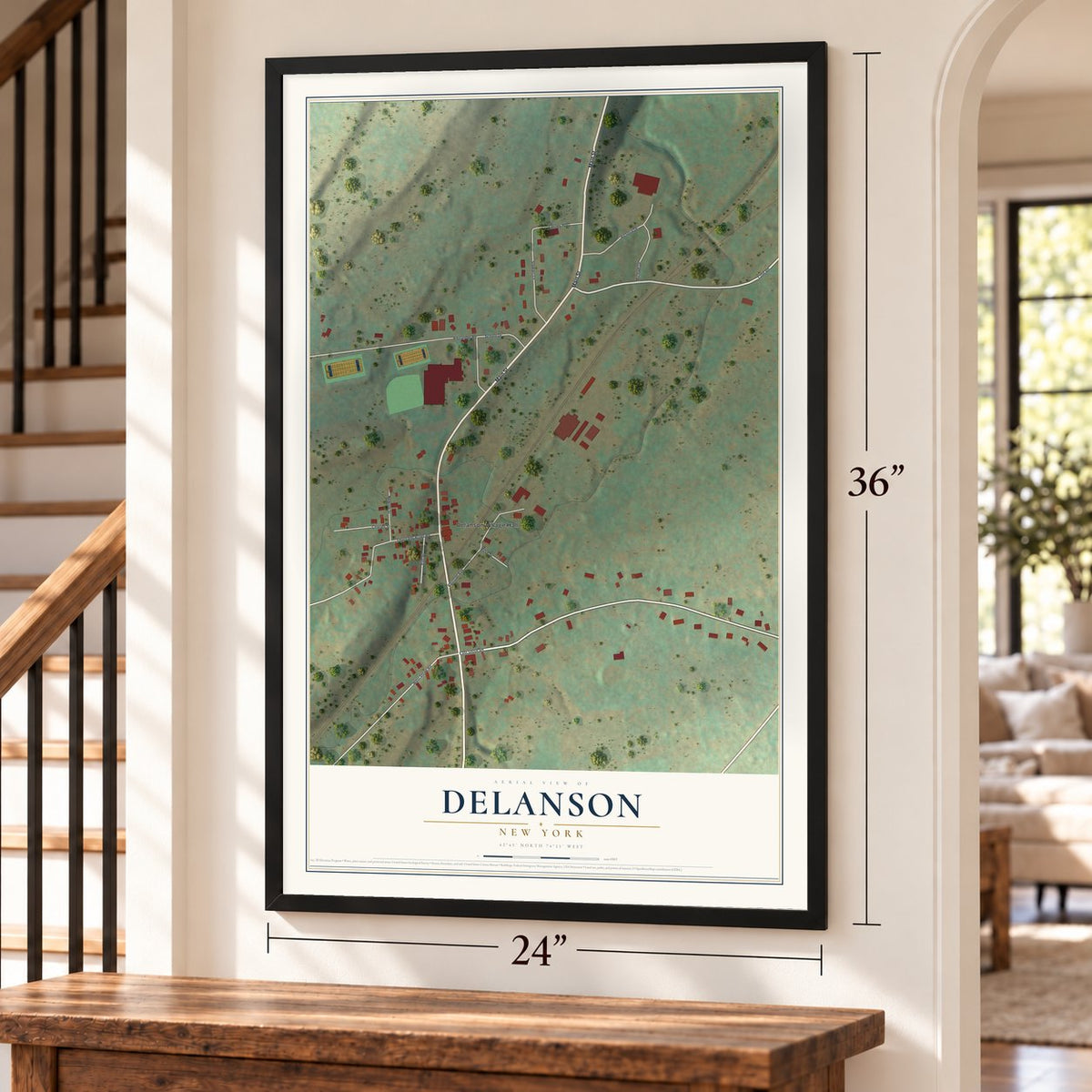 Delanson, New York map, 24 x 36 inch print in a black frame by a staircase