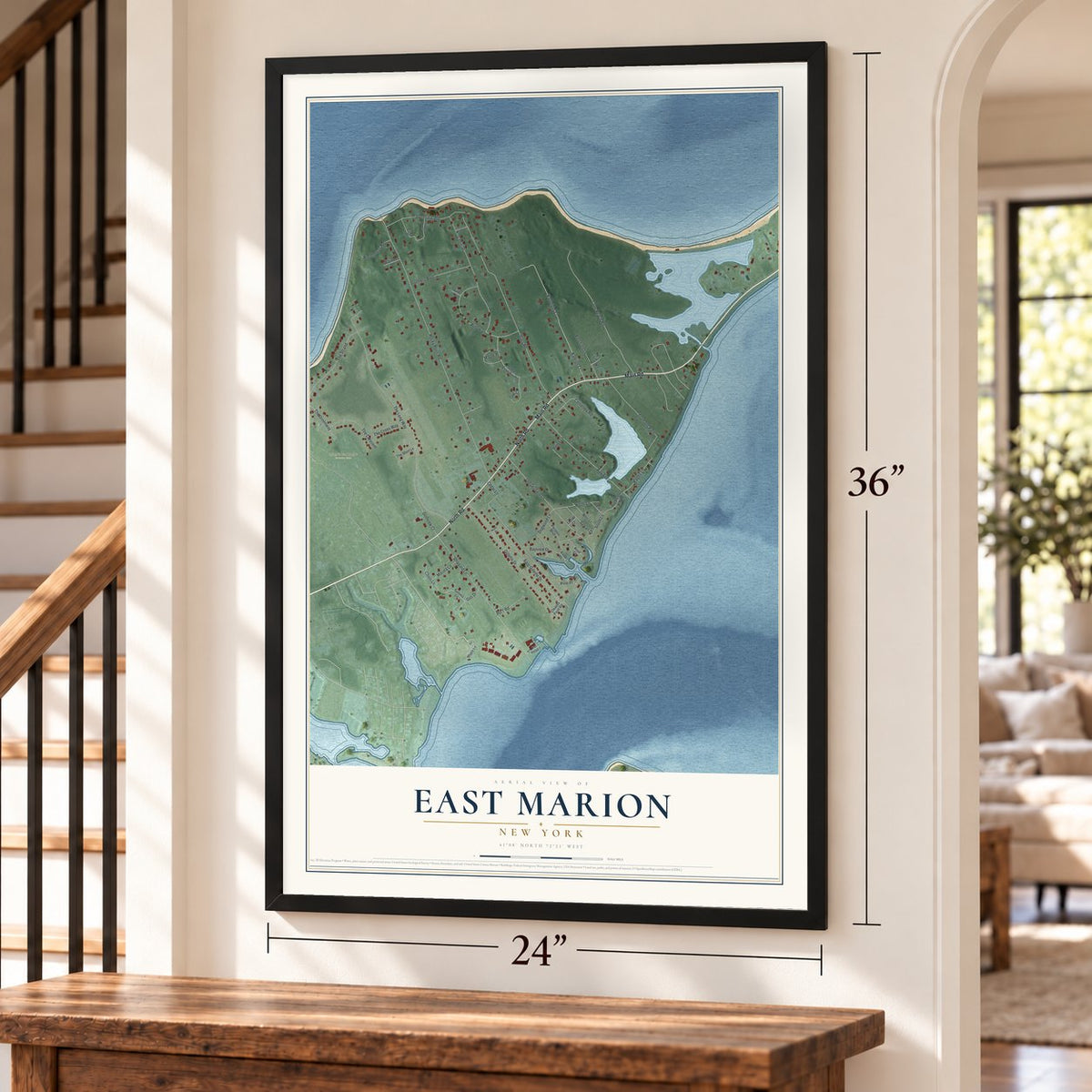East Marion, New York map, 24 x 36 inch print in a black frame by a staircase