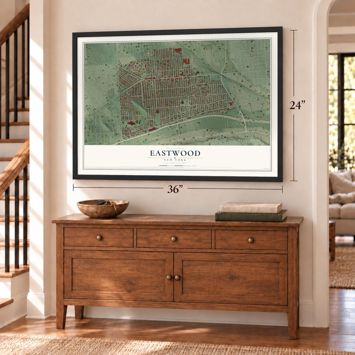 Eastwood, New York map, 24 x 36 inch print in a black frame above a dresser by a staircase