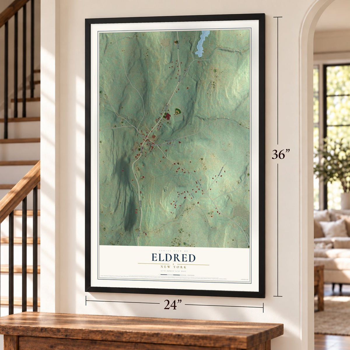 Eldred, New York map, 24 x 36 inch print in a black frame by a staircase