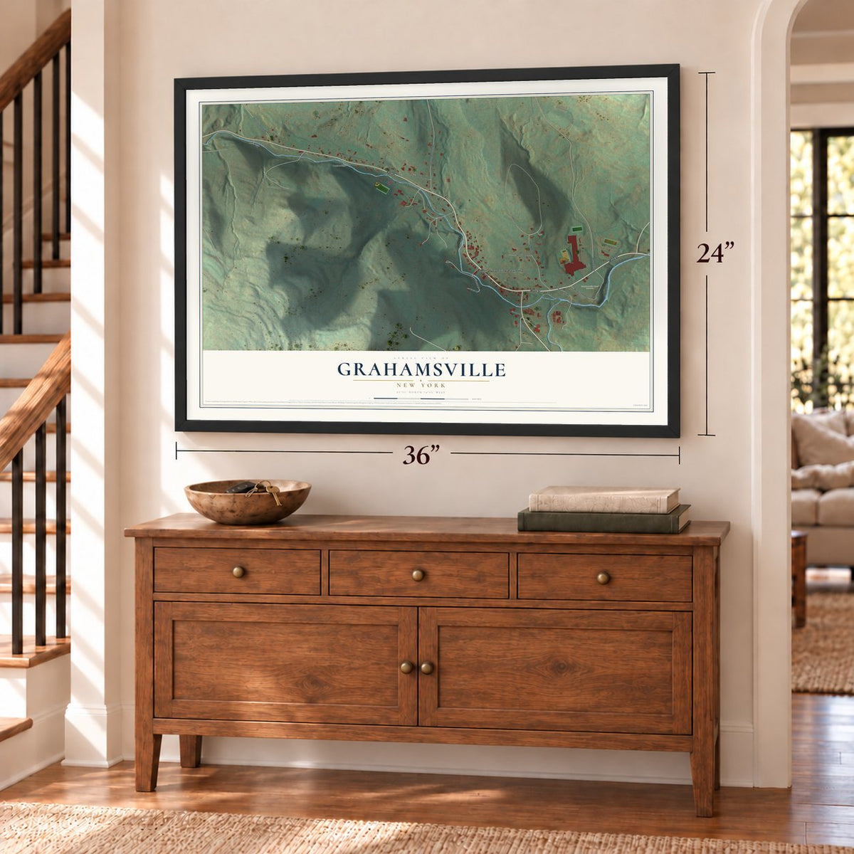 Grahamsville, New York map, 24 x 36 inch print in a black frame above a dresser by a staircase