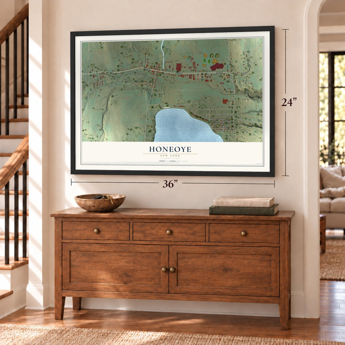 Honeoye, New York map, 24 x 36 inch print in a black frame above a dresser by a staircase