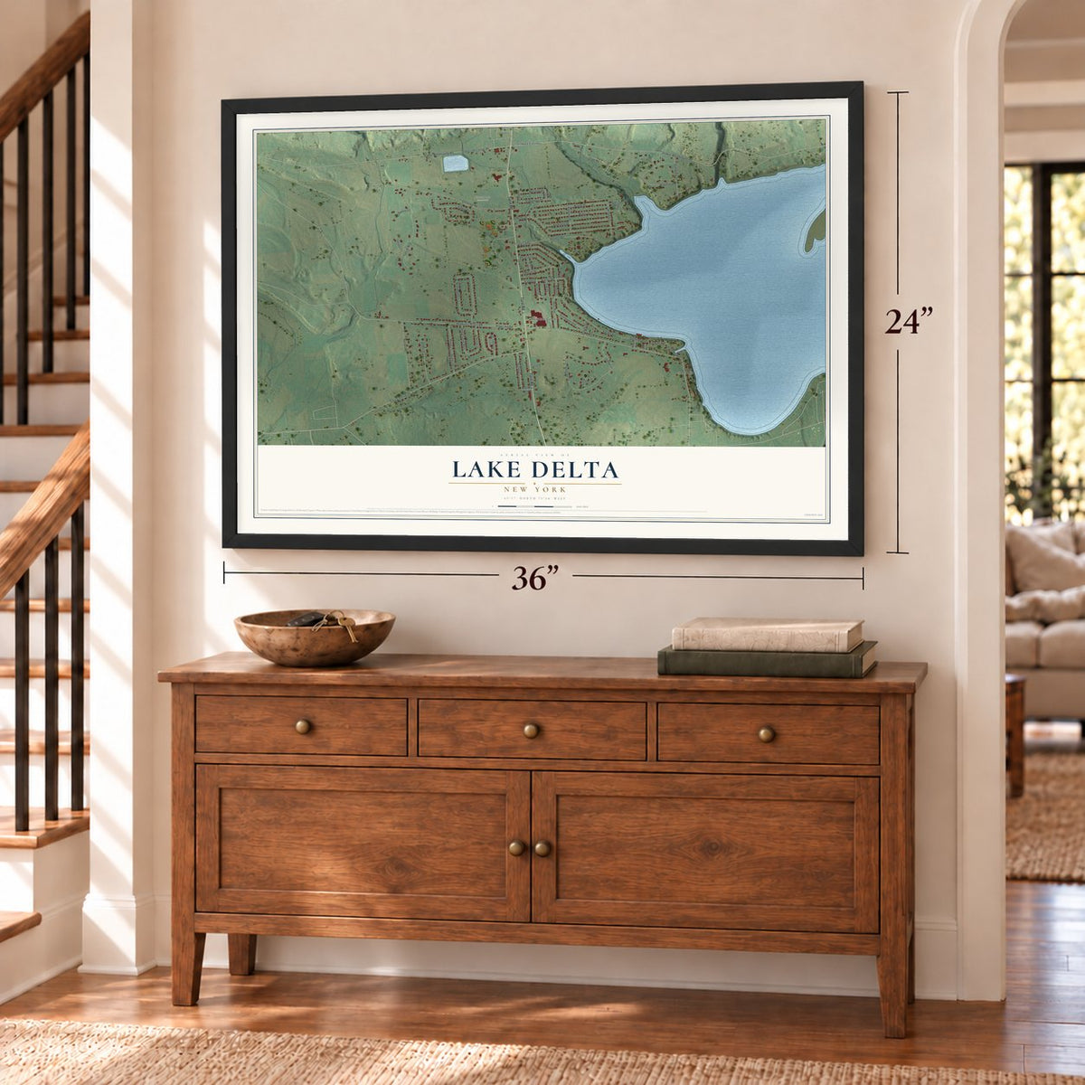 Lake Delta, New York map, 24 x 36 inch print in a black frame above a dresser by a staircase