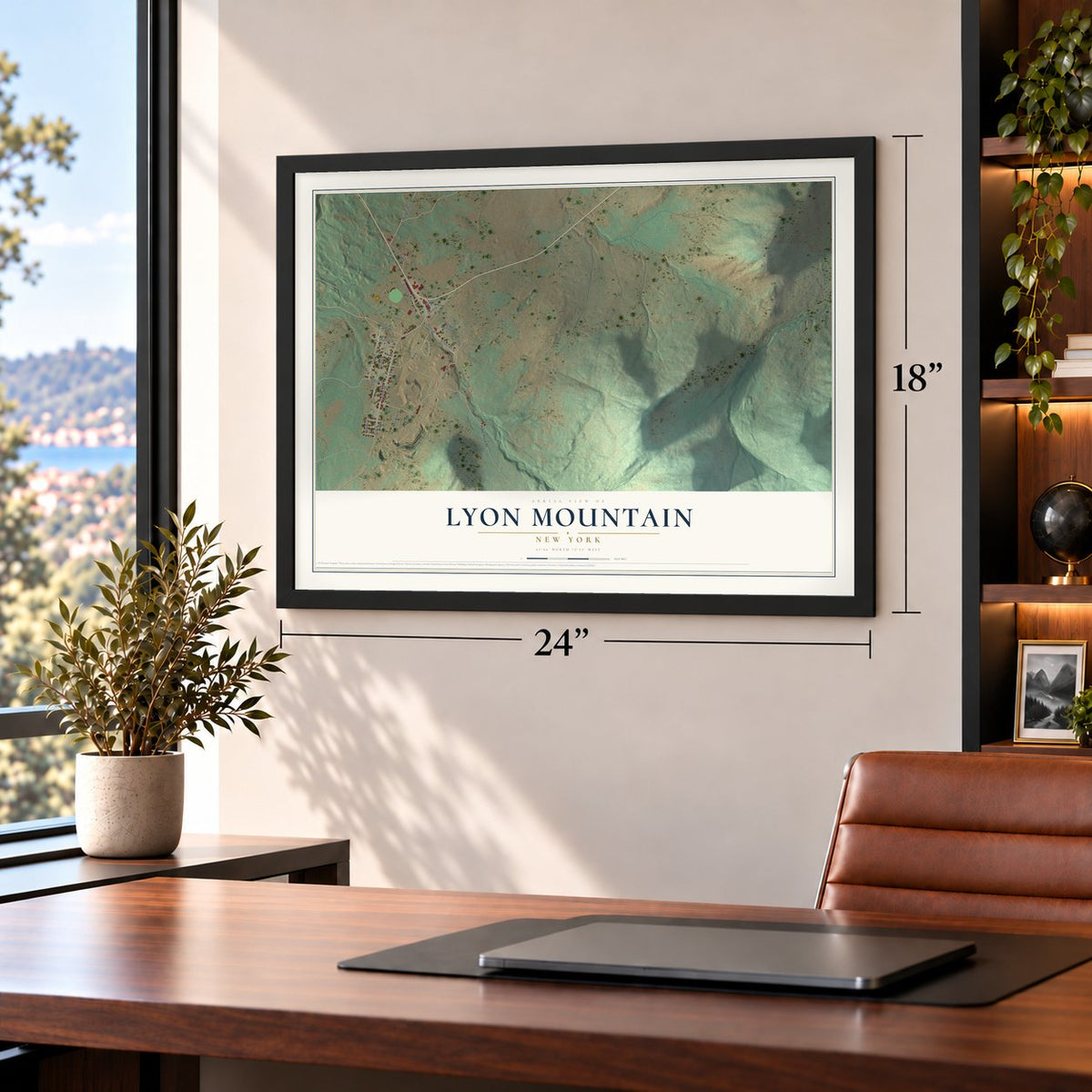 Lyon Mountain, New York map, 18 x 24 inch print in a black frame in a home office