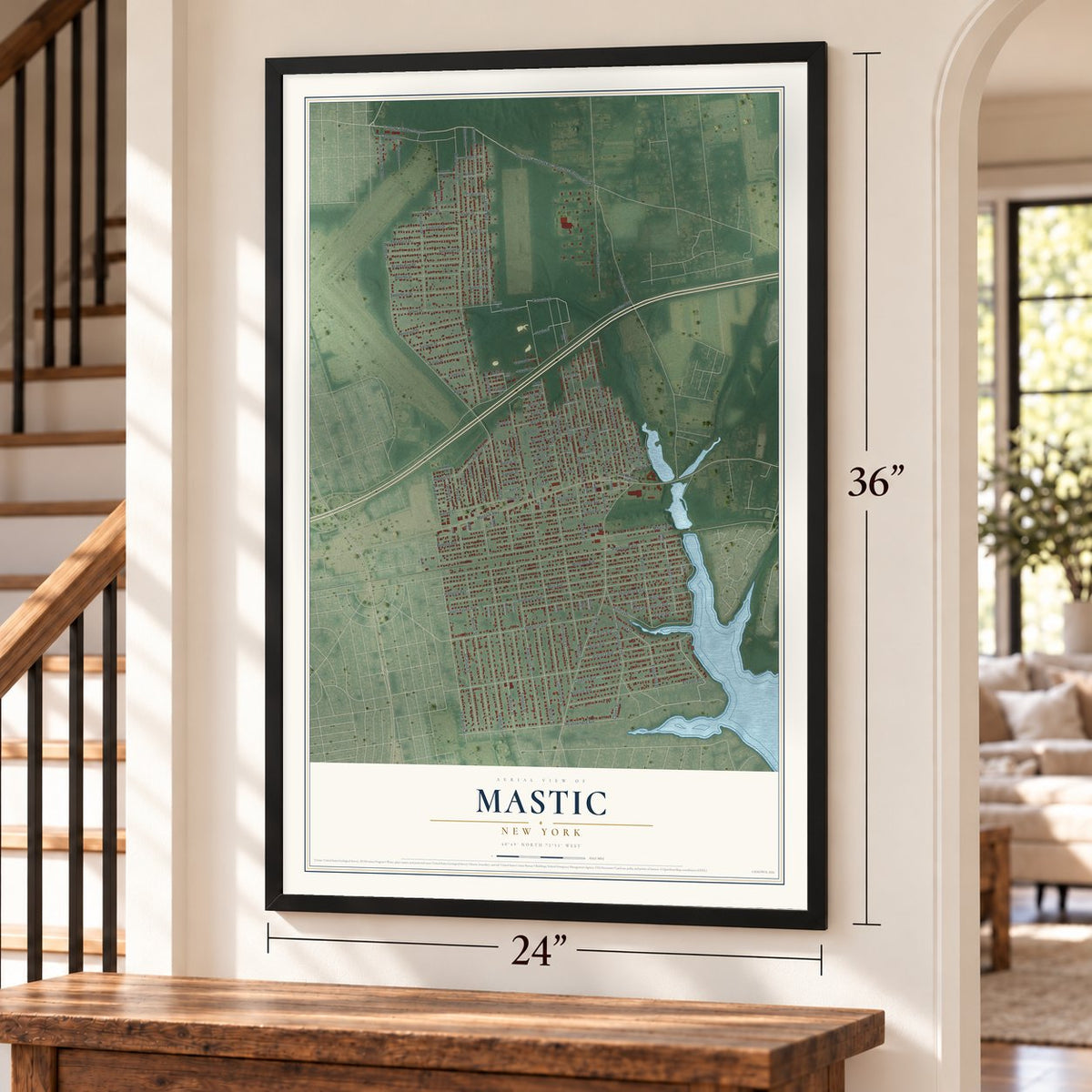 Mastic, New York map, 24 x 36 inch print in a black frame by a staircase