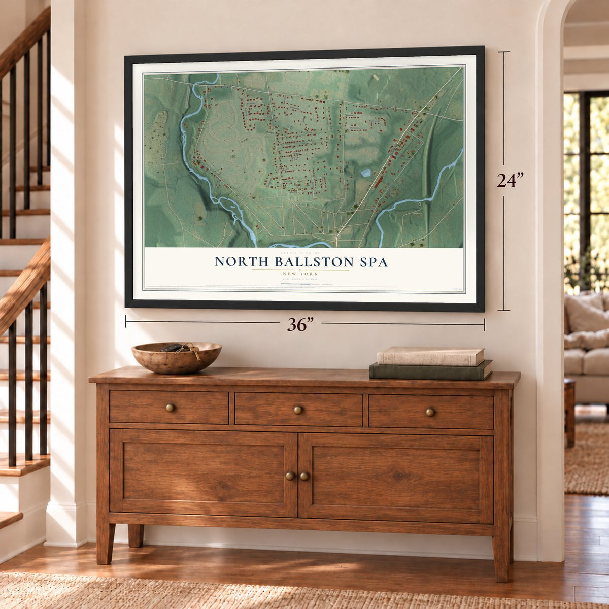 North Ballston Spa, New York map, 24 x 36 inch print in a black frame above a dresser by a staircase
