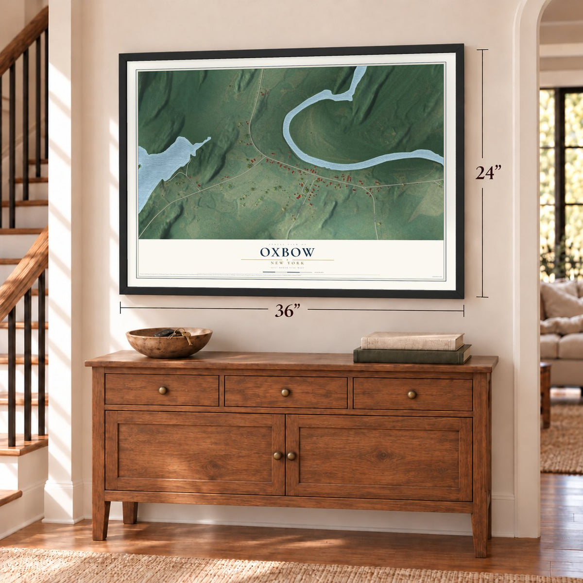 Oxbow, New York map, 24 x 36 inch print in a black frame above a dresser by a staircase
