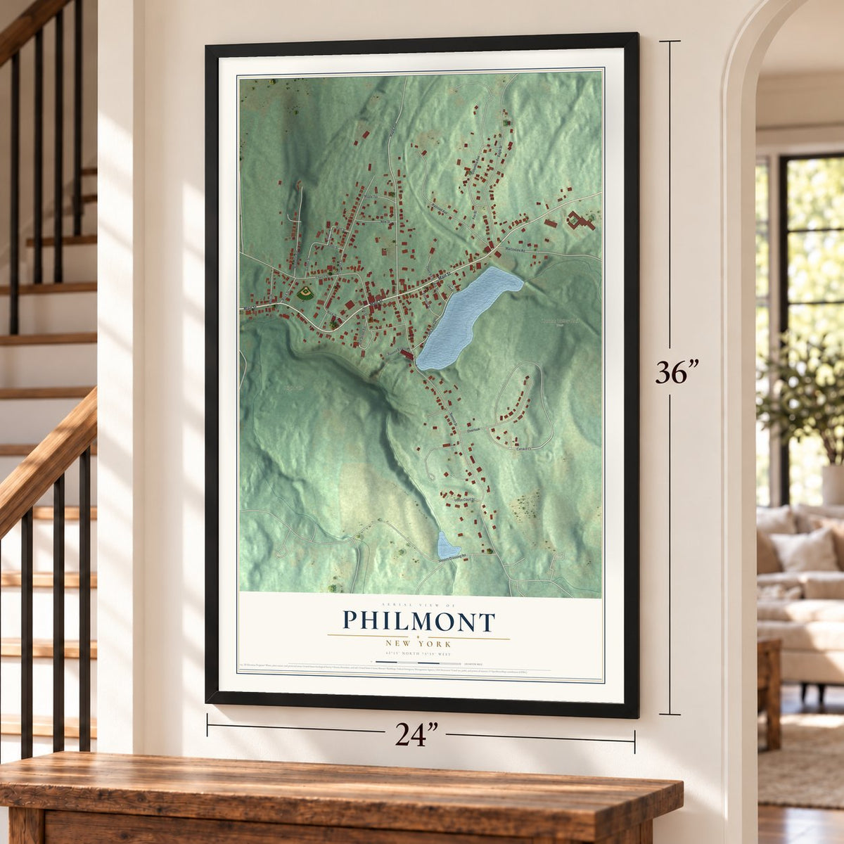 Philmont, New York map, 24 x 36 inch print in a black frame by a staircase