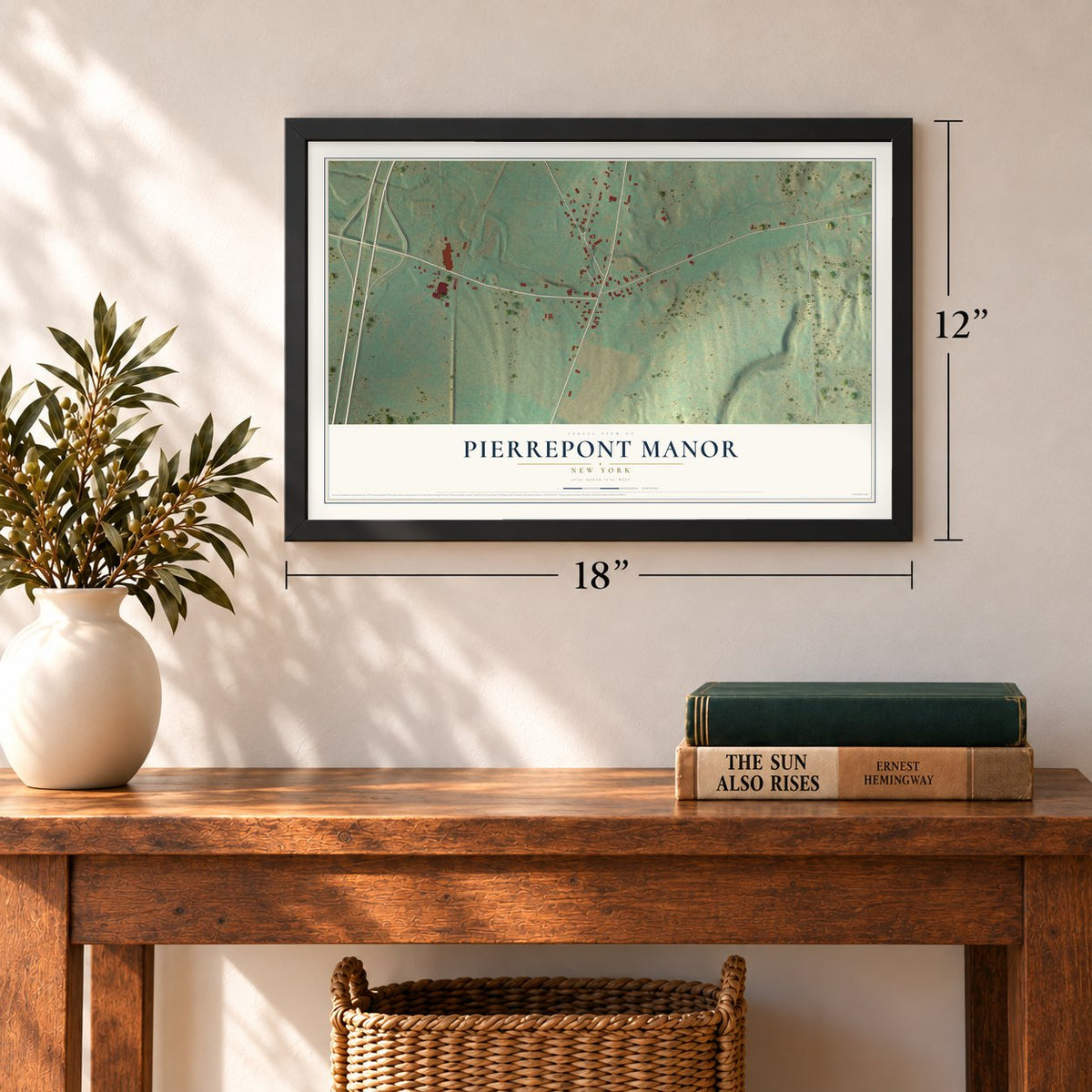 Pierrepont Manor, New York map, 12 x 18 inch print in a black frame in an entryway