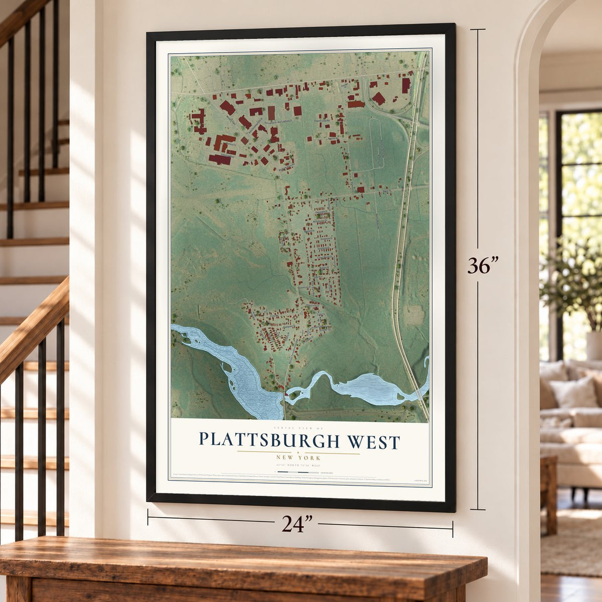 Plattsburgh West, New York map, 24 x 36 inch print in a black frame by a staircase