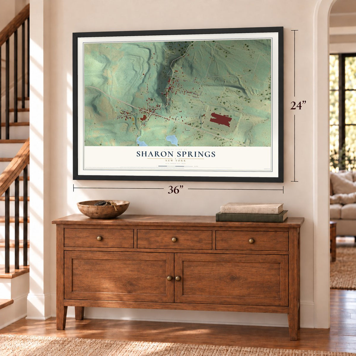 Sharon Springs, New York map, 24 x 36 inch print in a black frame above a dresser by a staircase