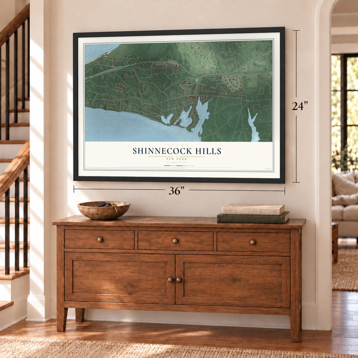Shinnecock Hills, New York map, 24 x 36 inch print in a black frame above a dresser by a staircase