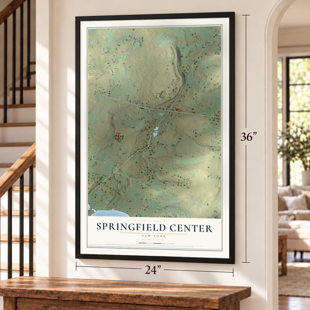 Springfield Center, New York map, 24 x 36 inch print in a black frame by a staircase